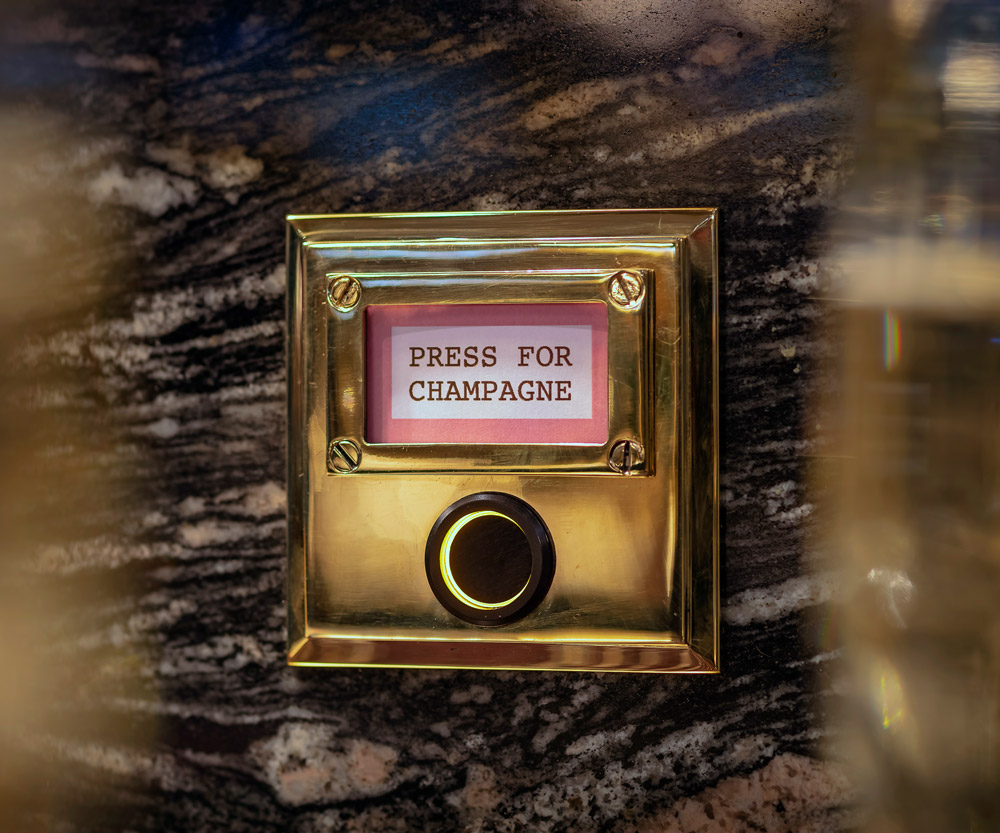 The famous Press for Champagne button